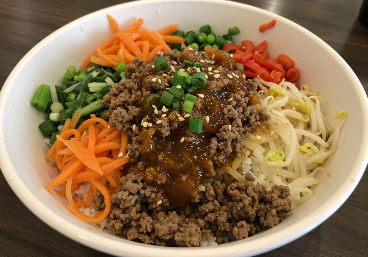 korean ground beef bowl with rice and green onions